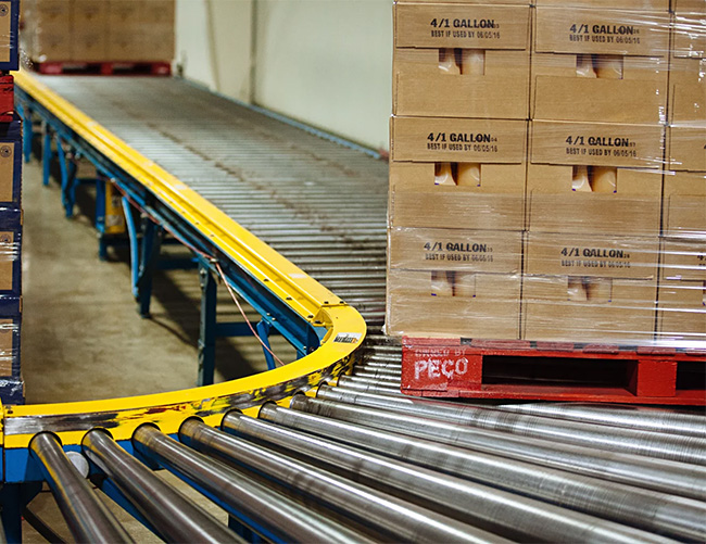 palletized load on roller conveyor