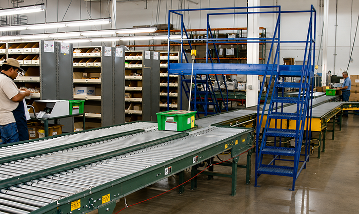 Conveyor crossover at aerospace distribution center