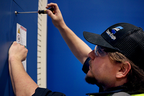 Technician working on a VLM installation.