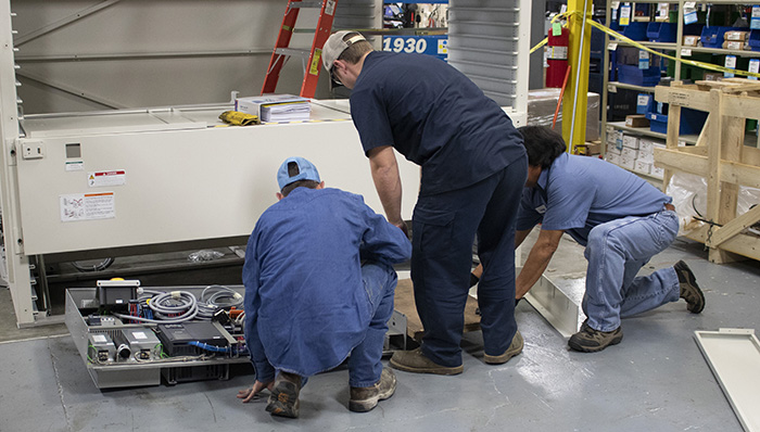 VLM installation crew at work.