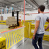 AisleCop gates guarding a forklift and pedestrian intersection