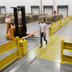 AisleCop gates guarding a forklift and pedestrian intersection