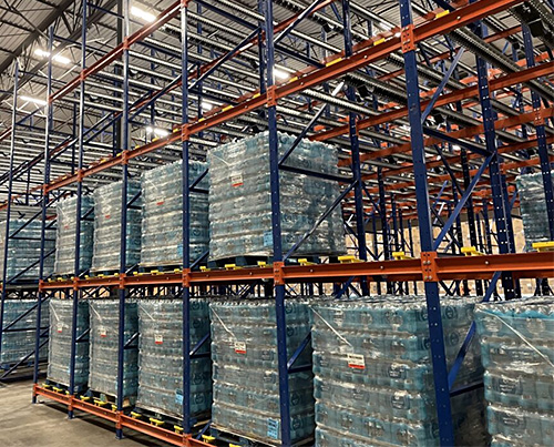 bottled goods in a pallet flow storage system