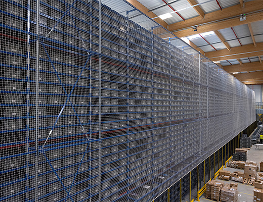 tall asrs with totes and safety netting