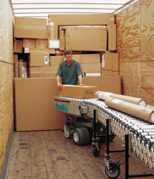 Loading conveyor inside a truck trailer