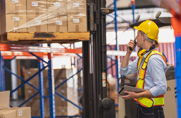 Pallet rack system in a warehouse with warehouse management inspection