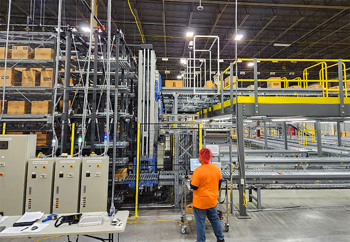 Sortation conveyors delivering product to as/rs system