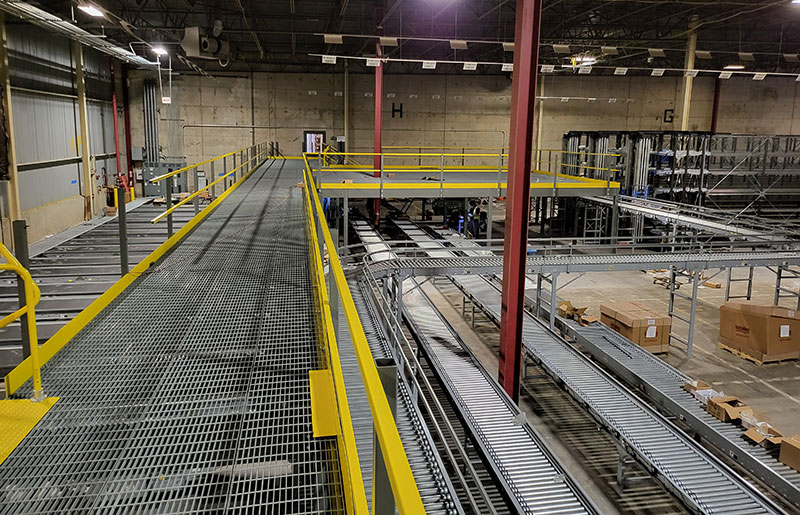 View from a mezzanine of conveyor and as/rs sortation system.