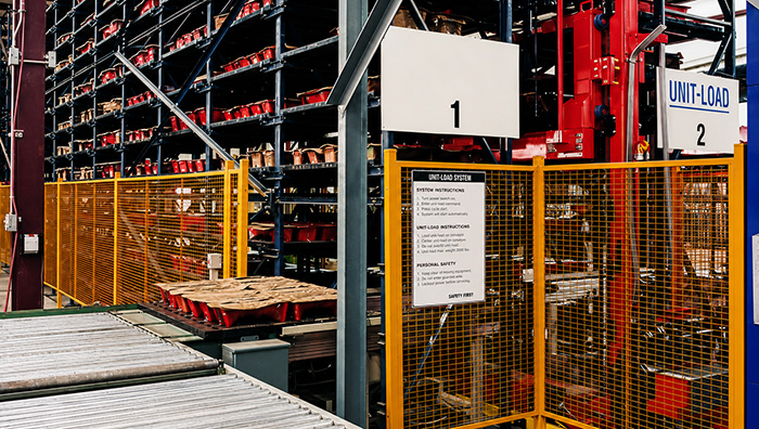 Unit load AS/RS system with infeed conveyor line
