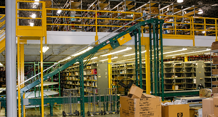 Mezzanine with incline conveyor for product access