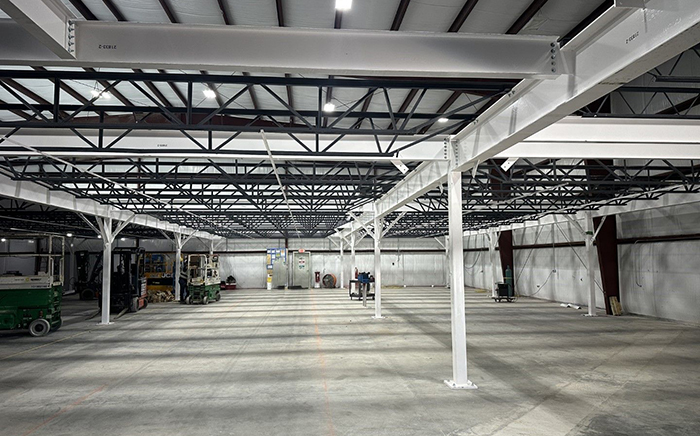 New space created by structural steel warehouse mezzanine