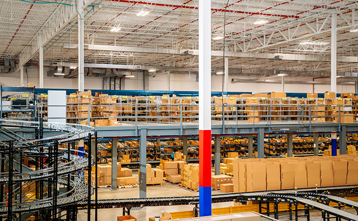 Structural pick module with carton flow and takeaway conveyor system