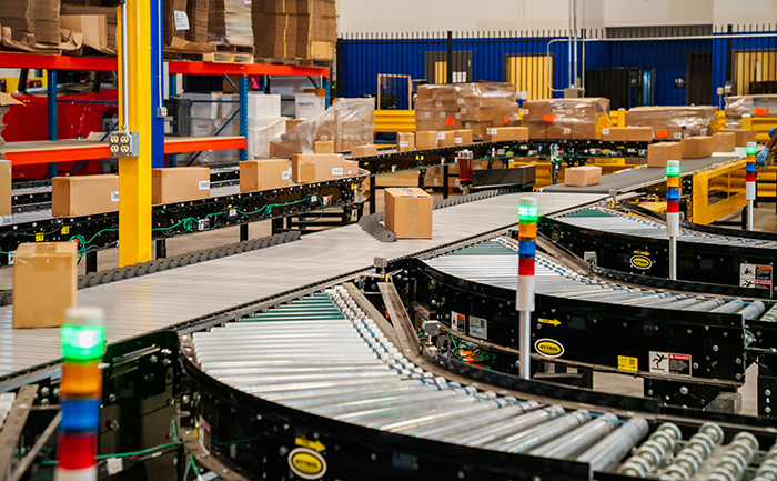 High speed case sorter sends cartons to the proper destination for shipping