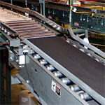 conveyor system overhead in a manufacturing facility