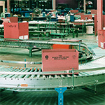 Conveyor System Boosts Rug Finishing Throughput