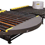 Heavy duty roll handling conveyor with turntable