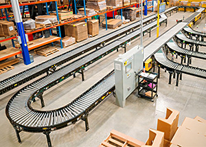 curve, straight and gravity spur conveyors in a distribution center